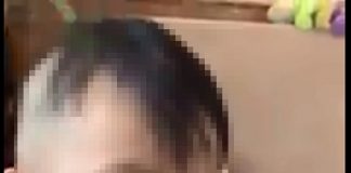 Hình ảnh bé trai bị cho hút Shisha khiến dư luận bức xúc. (Ảnh cắt từ clip).