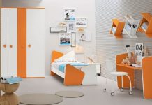 Another gender neutral scheme, this sunny orange and white number with cool blue touches is bright and fun. A few wooden elements adds a tiny dash of sophistication for maturing teenagers. A quirky desk area may help to make study time a little bit more attractive.