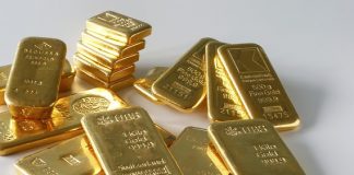 Giá vàng hôm nay 24/3/2016 lập đáy gần 1 tháng, đô la vọt tăng