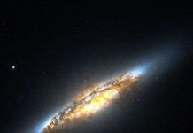 Kính Hubble phát hiện thiên hà thấu kính rực rỡ